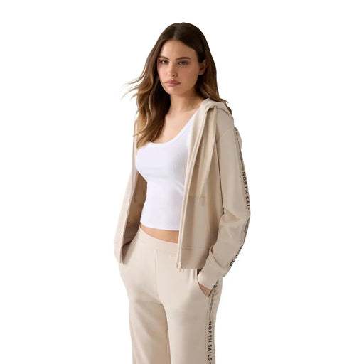 Guess Sweat à capuche zippé beige pour femme, mélange de modal, avec inscription noire verticale sur les manches et le bas visible au dos
