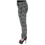 Guess Pantalon slim en coton noir pour femme, avec motif texturé abstrait noir et blanc et poches, taille W0BA46