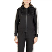 Black guess women hooded zip sweatshirt in cotton polyester with gray side panels and a subtle chest logo