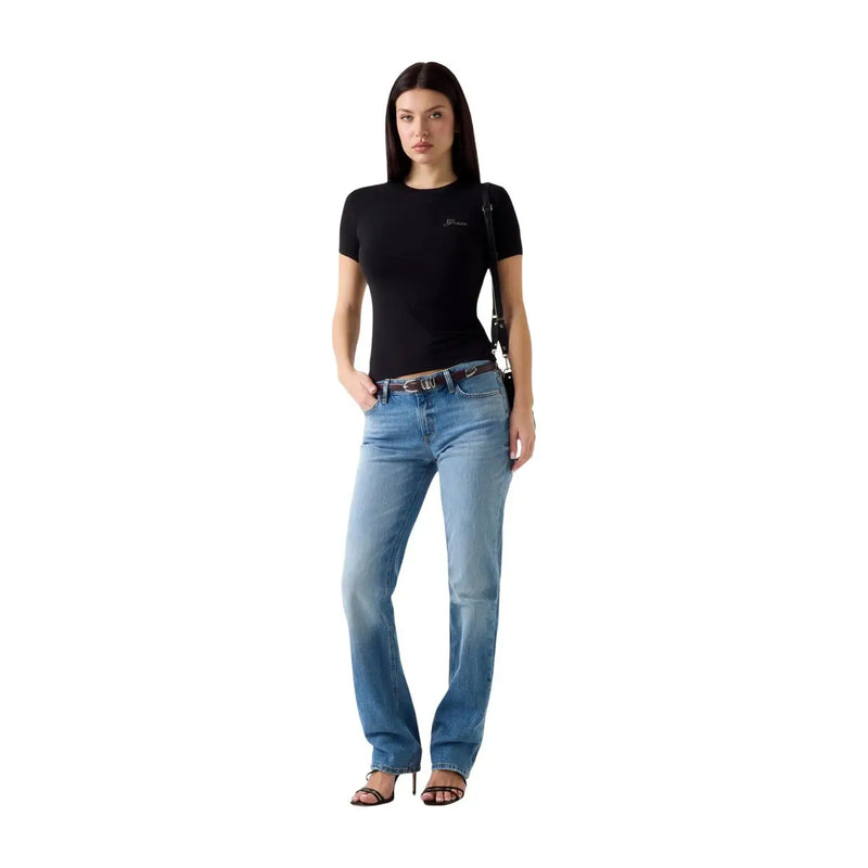 Guess women black modal lycra short sleeve t shirt paired with blue denim jeans featuring a straight-leg cut and subtle fading