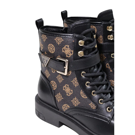 Guess Bottines noires pour femmes en polyuréthane avec motif noir et or et bride à boucle.