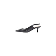 Guess women black synthetic leather slingback pump with pointed toe and silver-toned metal embellishments on vamp