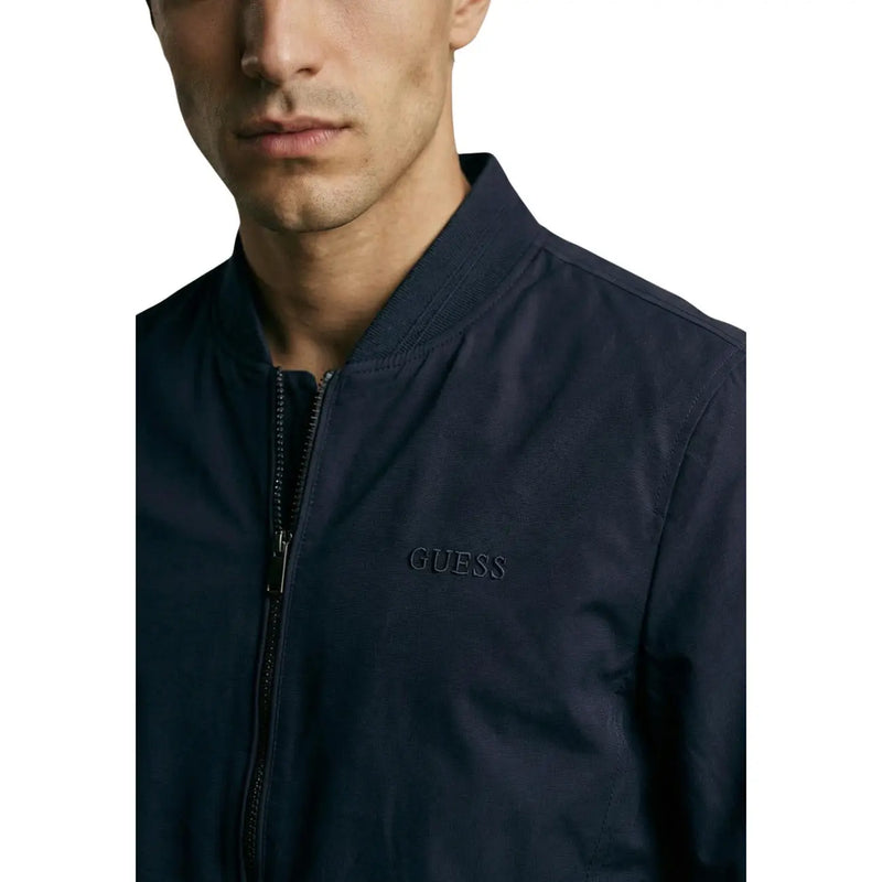 Guess women blue polyester blazer featuring a dark navy blue bomber jacket design with subtle embroidered logo on chest