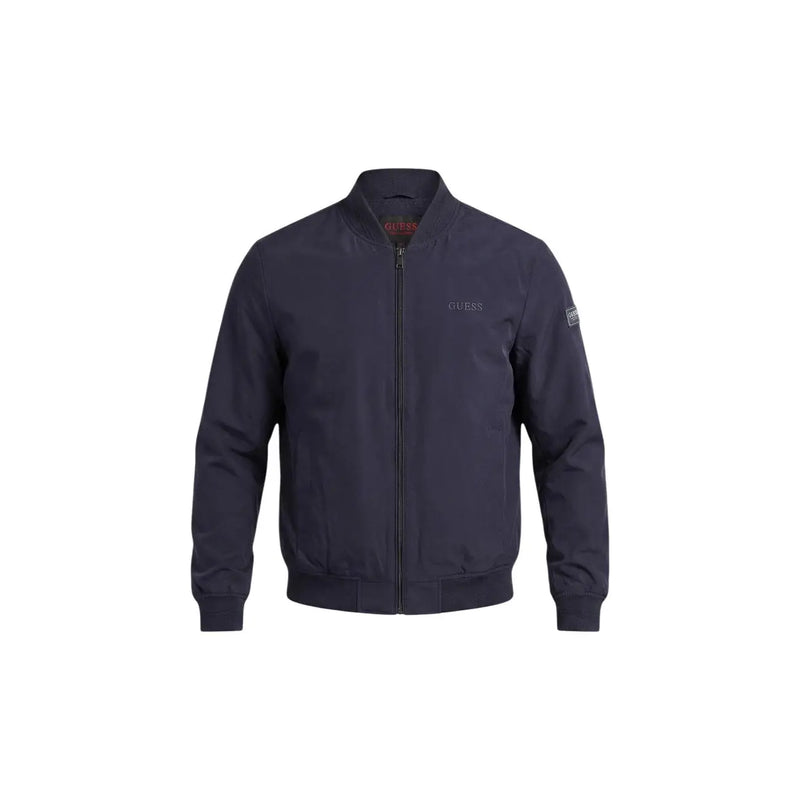 Dark navy blue Guess women polyester bomber jacket with subtle embroidered branding and zip pockets in sleek design