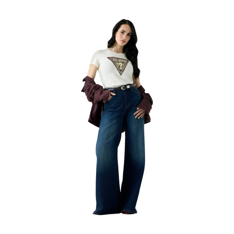 Woman wearing dark blue wide-leg jeans with a white Guess women cotton snake triangle round neck t shirt and maroon jacket