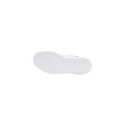White rubber sole with embossed guess logo pattern on beige polyurethane women sneakers lace up shoes