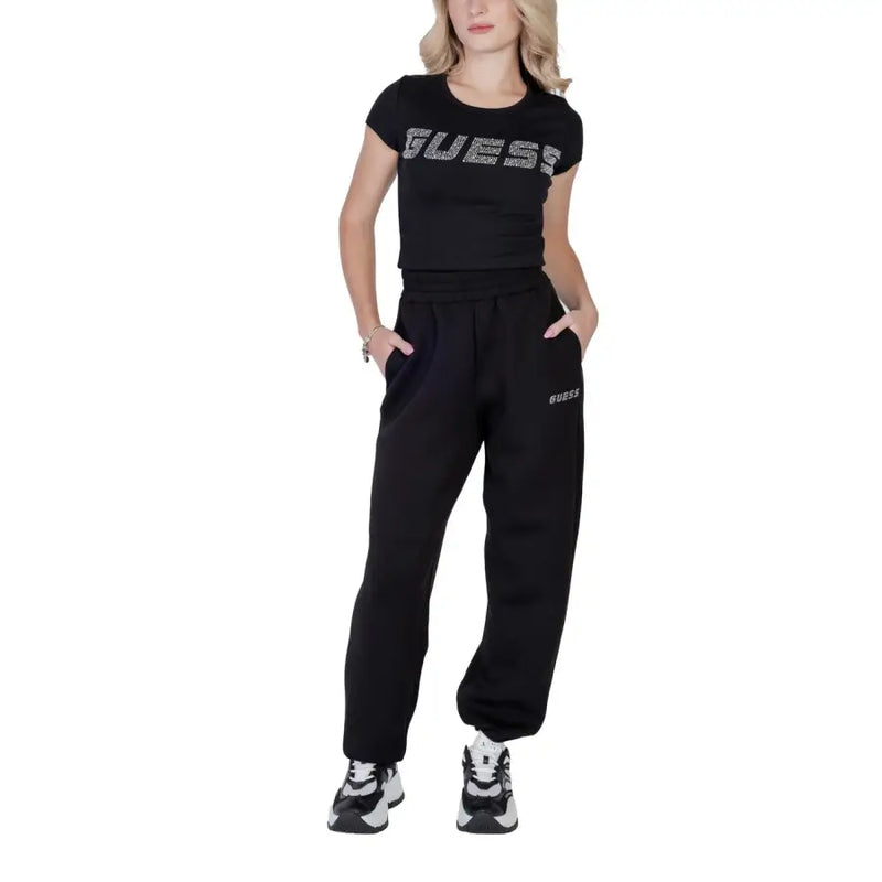 Black Guess women short-sleeved t-shirt with sparkling lettering made of cotton lycra featuring a round neck