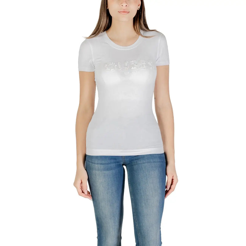 White Guess women cotton short sleeve t shirt with round neckline and raised silver logo lettering on the chest