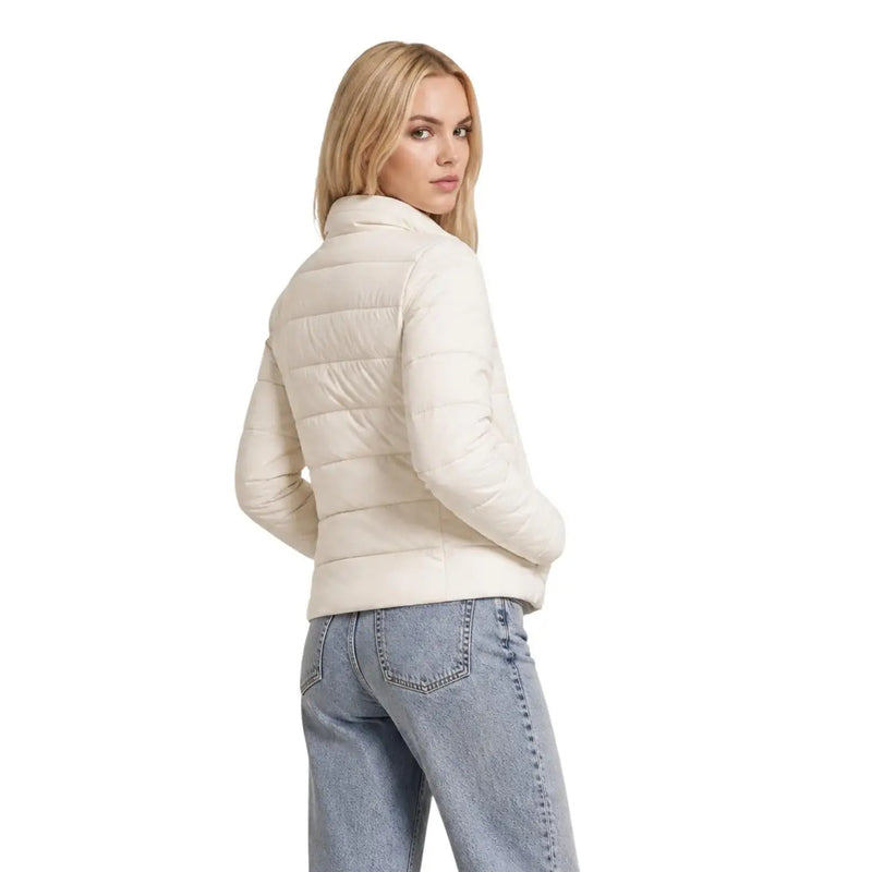 Doudoune matelassée couleur crème à col montant et manches longues en polyester de Guess Femmes