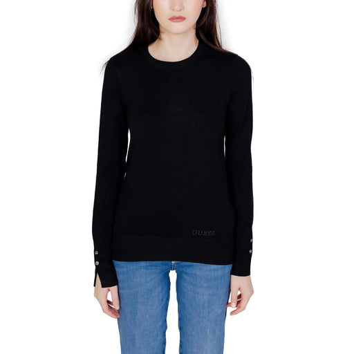 Guess black long-sleeved knit sweater with cuff buttons on white model