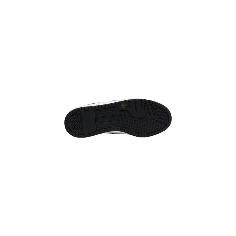 Black rubber sole with white midsole and textured tread of Guess women white polyurethane lace up sneakers visible from back