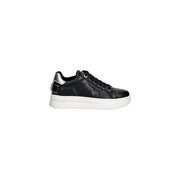 Black leather Guess women white sneakers with white platform sole and silver metallic heel accents slip on style