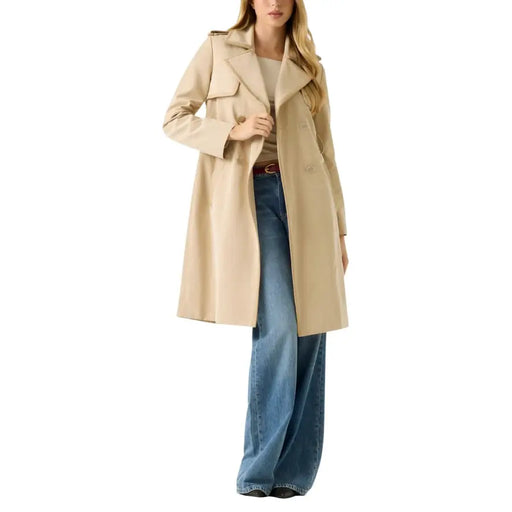 Guess women’s beige long belted blazer with v neck featuring classic double-breasted trench coat design and epaulets