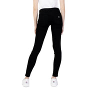 Le verso de Guess Jean skinny noir pour femme avec poches et un détail subtil Guess logo sur la poche arrière