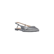 Guess womens grey slip on shoes featuring silver glittery slingback flats with pointed toe and decorative studs along strap