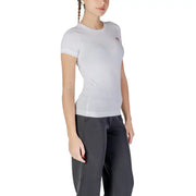 Guess T-shirt blanc à col rond et manches courtes pour femme t-shirt avec un logo rouge discret sur la poitrine pour une tenue décontractée