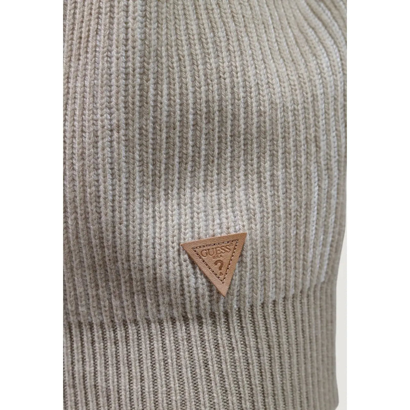Guess Pull en laine Niro Vanisãe pour femme, en maille côtelée beige avec écusson logo triangulaire en cuir camel, vue de face