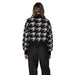 Women’s Houndstooth Turtleneck Sweater paired with classic Black Pants