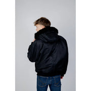 Blouson aviateur noir avec une capuche doublée de fausse fourrure douce, en polyamide de Hugo collection homme