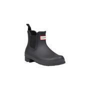 Hunter black rubber ankle boots for women featuring a chelsea style with a red and white logo patch on the side