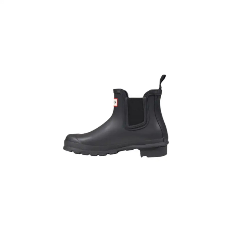 Hunter black rubber ankle boots for women with elastic side panels and a red logo patch on the ankle