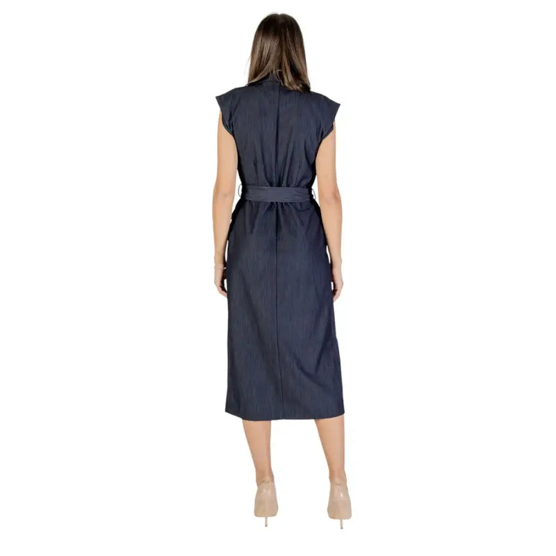 A navy blue sleeveless midi dress by Ichi with subtle pinstripes and a matching belt for fall and winter wear