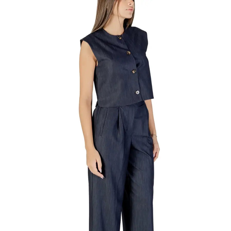 Women’s dark blue sleeveless button-up top and wide-leg pants set for the Ichi Women Blue Sleeveless Button Gilet with Round Neck