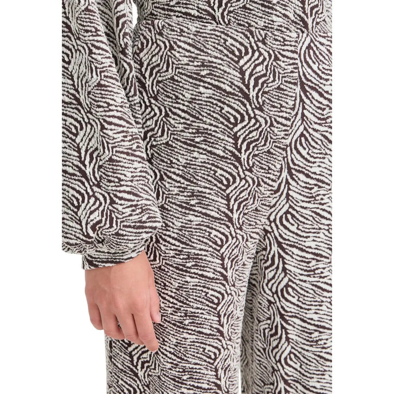A cozy long-sleeved loungewear set in black and white textured fabric with abstract zebra-stripe pattern from ichi women
