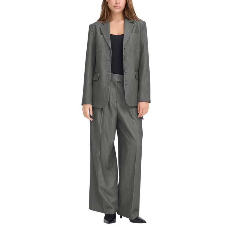 Gray polyester tailored blazer for women with structured shoulders and three front buttons by Ichi