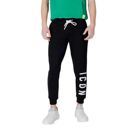 Icon Pantalon décontracté pour homme en mélange de coton noir à rayures, comprenant un pantalon de jogging noir avec cordon de serrage blanc et rayures verticales icon caractères