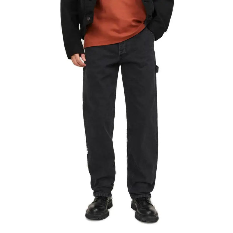 Black cargo pants with multiple pockets and a drawstring waistband, likely made of cotton or polyester blend.