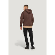 Un sweat-shirt à capuche marron, coupe décontractée et poignets côtelés, associé à Jack & Jones pantalon noir en mélange de coton
