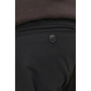 Black polyester men’s fall winter trousers with a single button on the back pocket