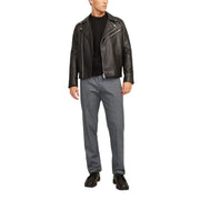 Black leather biker jacket with silver zippers and snap buttons paired with jack & jones grey cotton stretch trousers for men fall winter