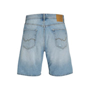 Light blue denim shorts with distressed details and a brown leather patch on the back.