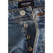 Jean homme bleu clair déchiré Jack & Jones en coton et élasthanne, avec étiquette de marque noire et boutons argentés.