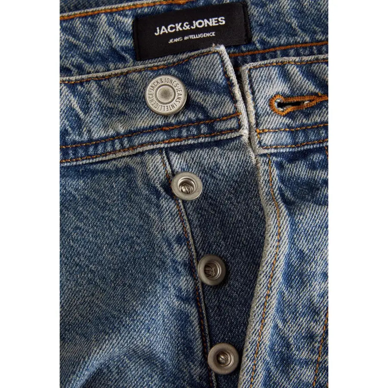 Jean homme bleu clair déchiré Jack & Jones en coton et élasthanne, avec étiquette de marque noire et boutons argentés.