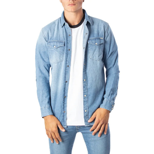 Light blue denim long-sleeved shirt with buttoned chest pockets and collar by Jack & Jones men shirt