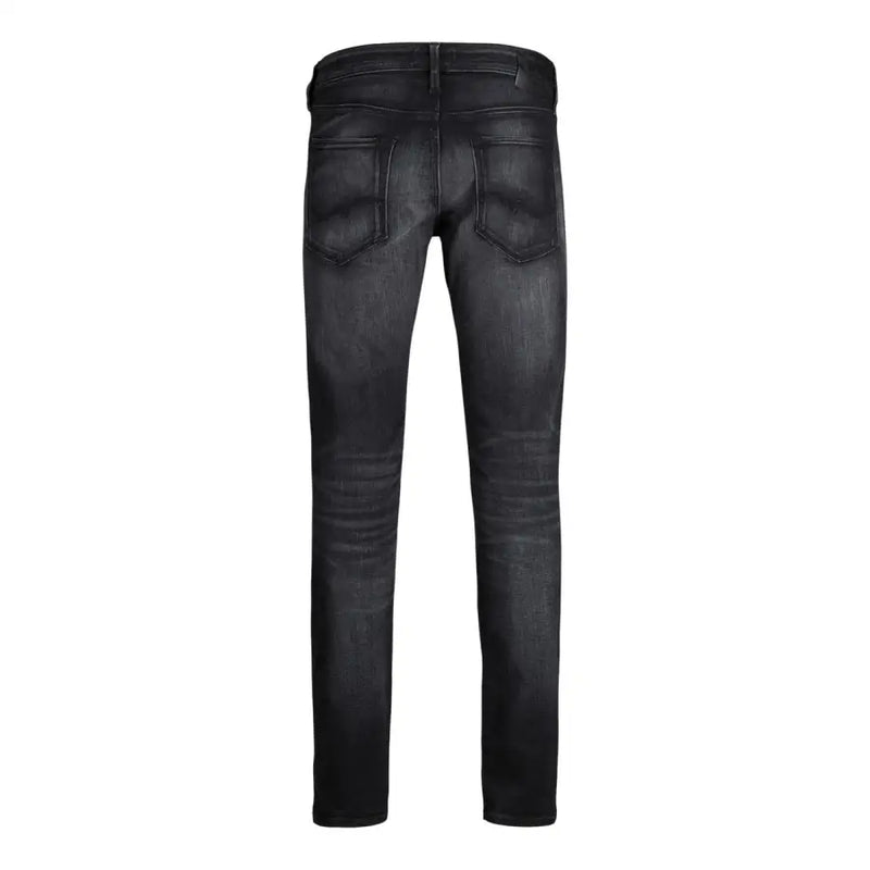 Jean slim noir pour homme Jack and Jones, en denim délavé et légèrement usé, idéal pour l'automne-hiver.