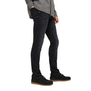 Jean slim noir pour homme Jack and Jones, en denim noir, avec un délavage subtil et une coupe classique à cinq poches, idéal pour l'automne-hiver.