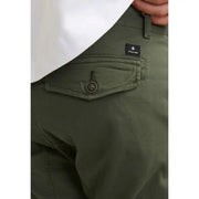 Jack & Jones Pantalon chino homme en coton vert olive, poches, bouton noir et étiquette de marque visibles