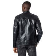 Blazer long zippé pour homme Jack & Jones en cuir noir avec empiècements matelassés aux épaules et poignets à boutons-pression, idéal pour l'automne-hiver.