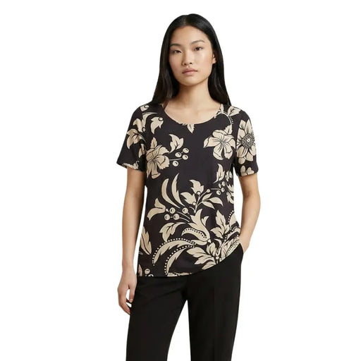 Jacqueline de yong black short sleeve blouse with cream floral and vine pattern for casual or office wear