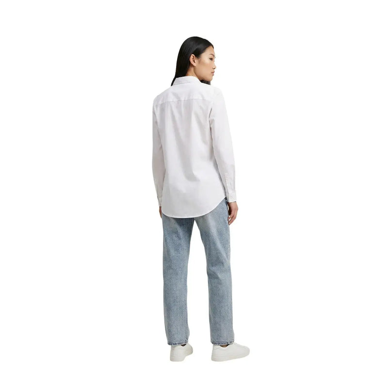 White long-sleeved cotton shirt by jacqueline de yong with a classic collar and relaxed fit for women