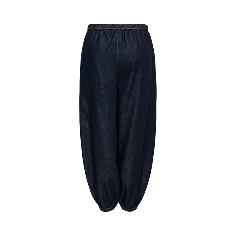 Jean en denim bleu pour femme Jacqueline de yong, coupe classique, pantalon fuselé bleu foncé et taille élastiquée.