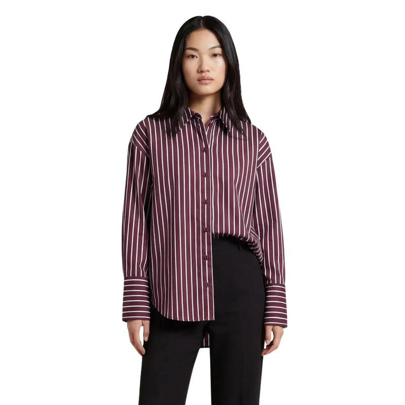 A Jacqueline De Yong women Bordeaux striped cotton shirt with maroon and white vertical stripes and long sleeves