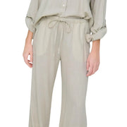 Pantalon en lin beige avec taille élastiquée à cordon et manches retroussées de Jacqueline De Yong collection femme en lin gris coupe classique