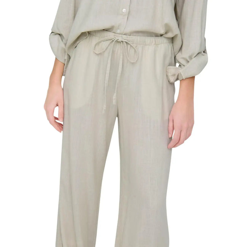 Pantalon en lin beige avec taille élastiquée à cordon et manches retroussées de Jacqueline De Yong collection femme en lin gris coupe classique