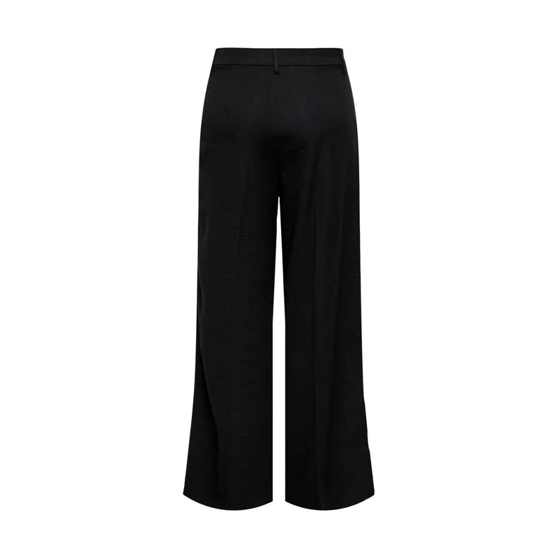 Pantalon noir pour femme Jacqueline de yong, coupe large, fermeture éclair sur le devant et tissu lisse et brillant.
