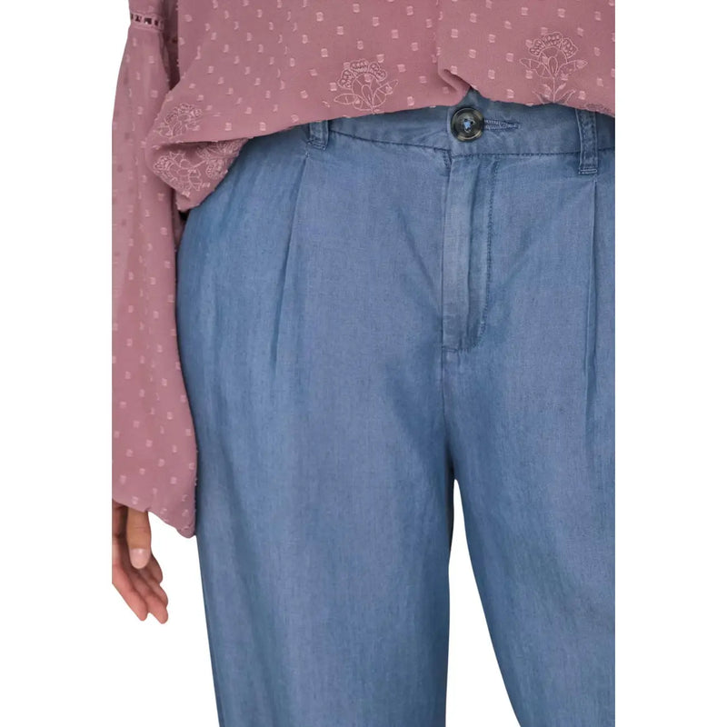 Pantalon Jacqueline de yong pour femme, jambes larges, en lyocell bleu clair, fermeture boutonnée et plis sur le devant.